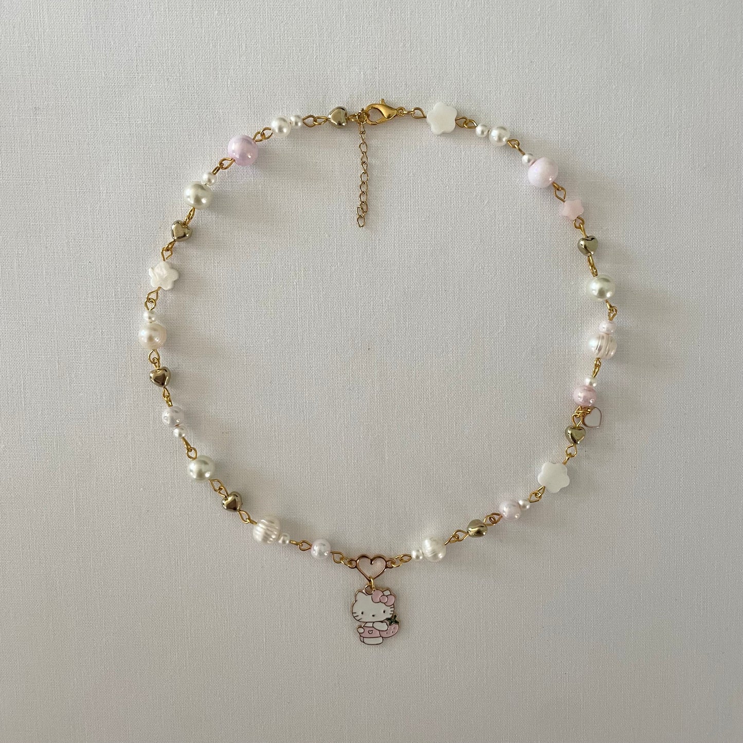 hello kitty pearl necklace